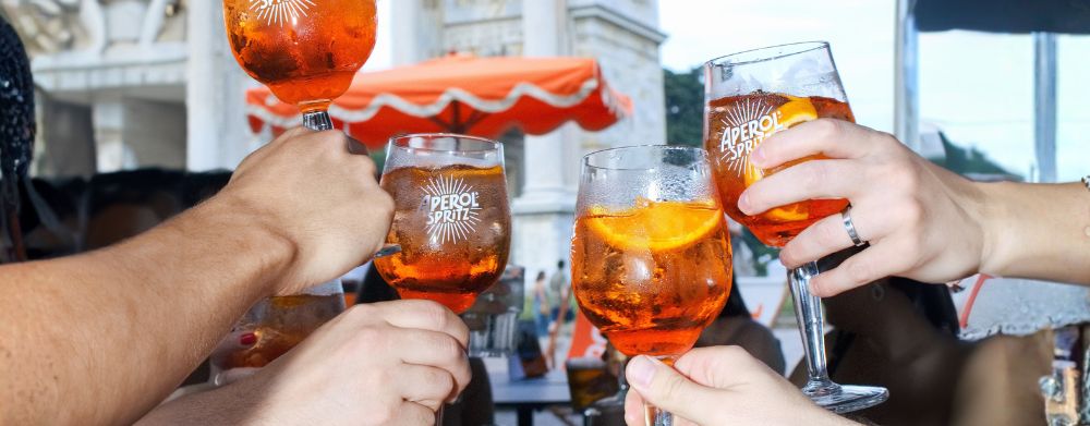 People having a toast with Aperol Spritz - Campari Group customer story