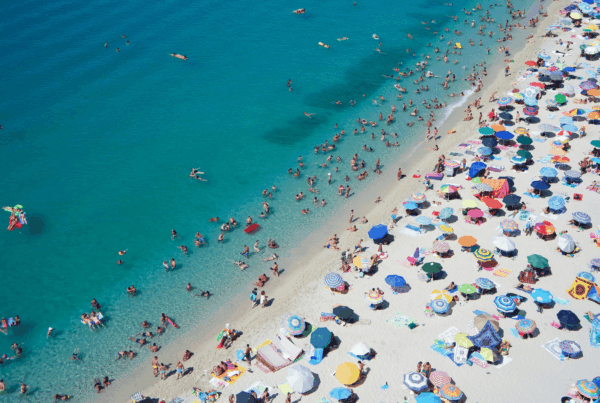 A crowded beach in the Mediterranena - Report perception of climate in the Mediterranean