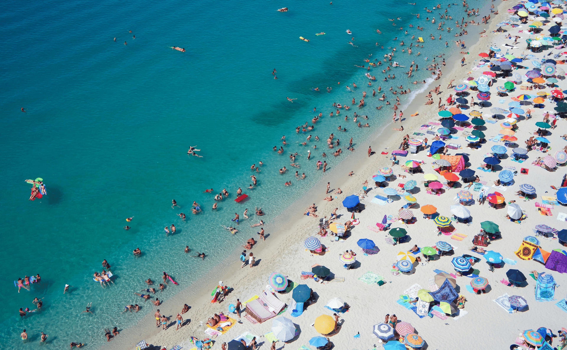 A crowded beach in the Mediterranena - Report perception of climate in the Mediterranean